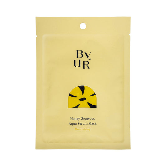 Front of a yellow BYUR sheet mask packaging with text and branding.
